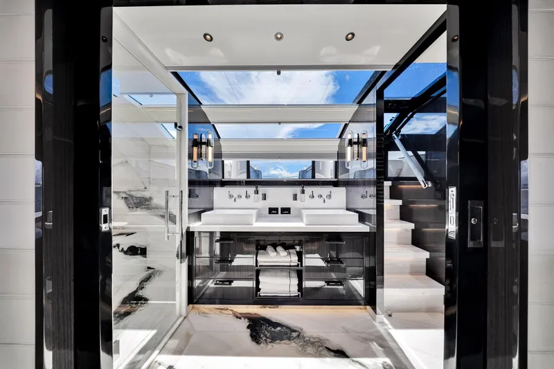 Slide: The Image of Luxurious bathroom interior on 2021 Sirena 88 yacht, featuring modern design and marble accents. - 80