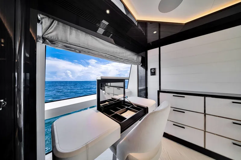 Slide: The Image of Luxurious interior of 2021 Sirena 88 yacht with ocean view and elegant furnishings. - 73
