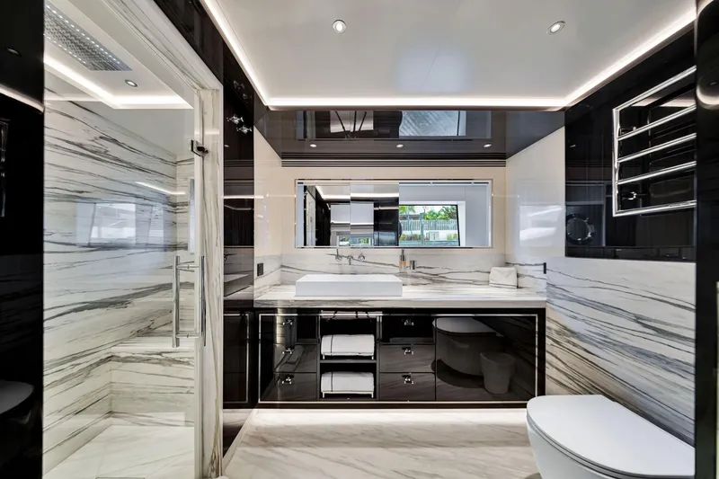 Slide: The Image of Luxurious bathroom in 2021 Sirena 88 yacht with marble accents and modern fixtures. - 130