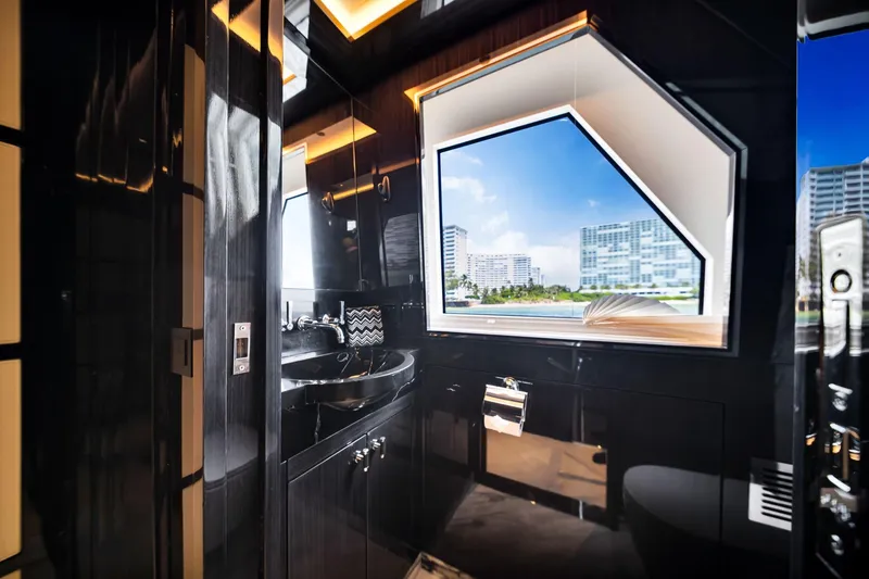 Slide: The Image of Luxurious bathroom interior of 2021 Sirena 88 yacht with modern fixtures and large window view. - 67