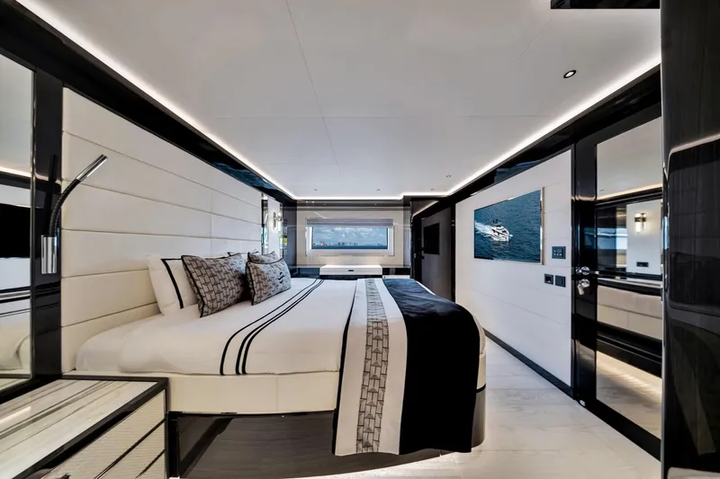 Slide: The Image of Luxurious bedroom interior on 2021 Sirena 88 yacht, featuring modern design and elegant decor. - 126