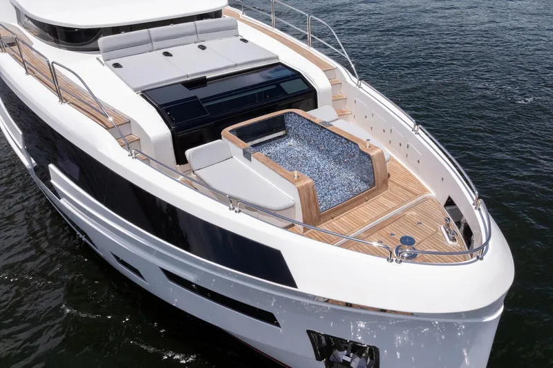 Slide: The Image of Luxurious 2021 Sirena 88 yacht with spacious deck and modern design on the water. - 32