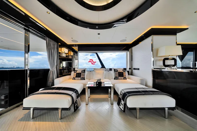 Slide: The Image of Luxurious interior of 2021 Sirena 88 yacht with modern furnishings and panoramic ocean view. - 51
