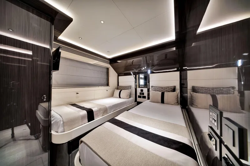 Slide: The Image of Luxurious interior of 2021 Sirena 88 yacht with modern twin beds and sleek design. - 110