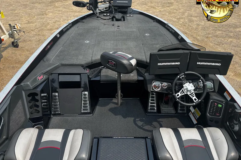 Slide: The Image of 2018 Ranger Z520L boat interior with dual Humminbird displays and sleek seating. - 9