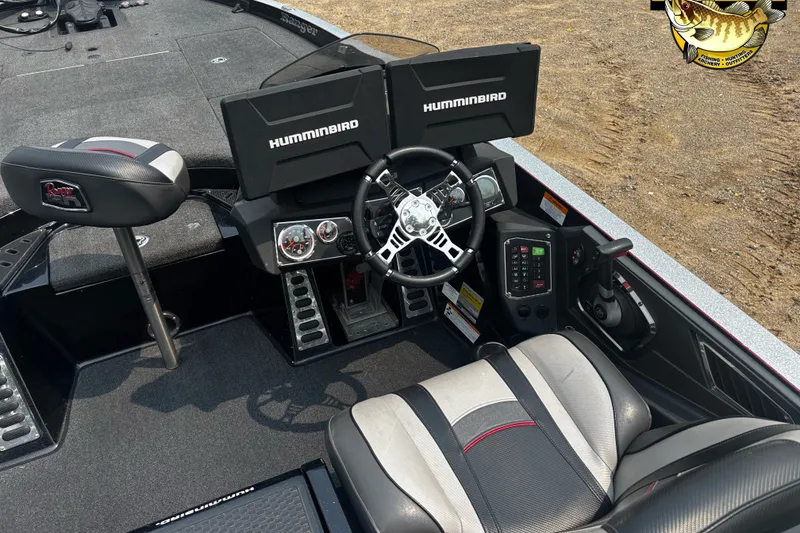 Slide: The Image of 2018 Ranger Z520L boat cockpit with dual Humminbird displays and steering wheel. - 8