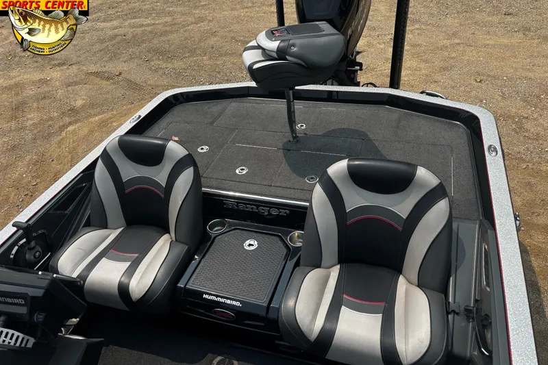 Slide: The Image of 2018 Ranger Z520L boat interior with dual seats and fishing equipment. - 7