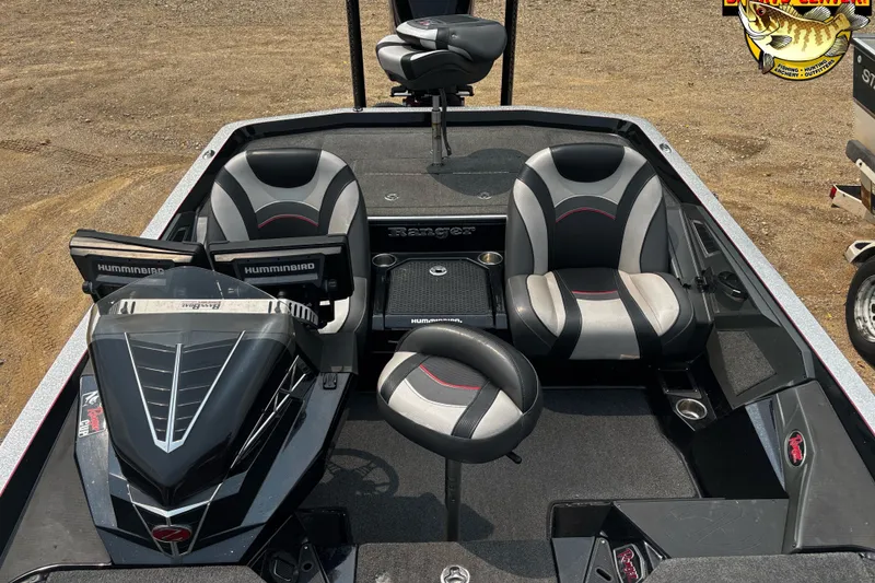 Slide: The Image of 2018 Ranger Z520L boat interior with dual seats and Humminbird electronics. - 6