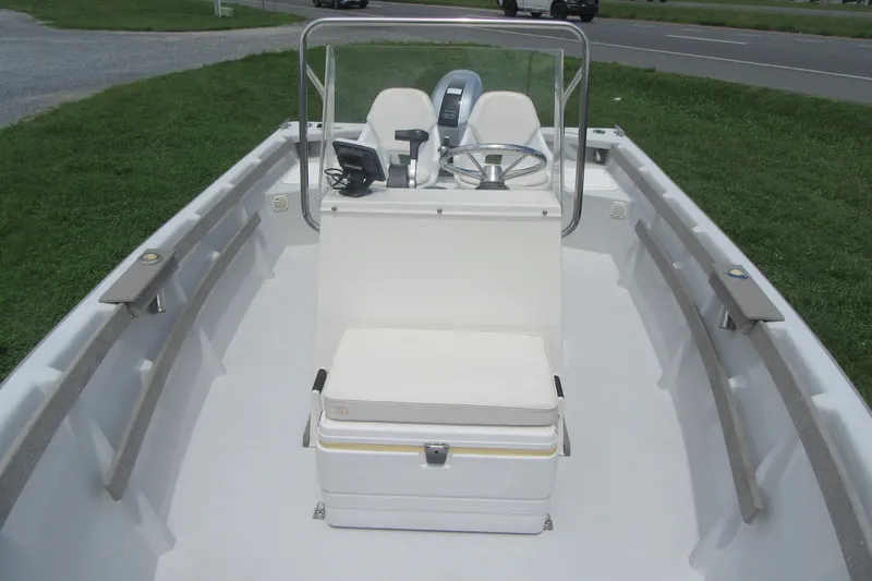 Slide: The Image of 2015 Allied 17 Sportsman boat interior with steering console and seating. - 12