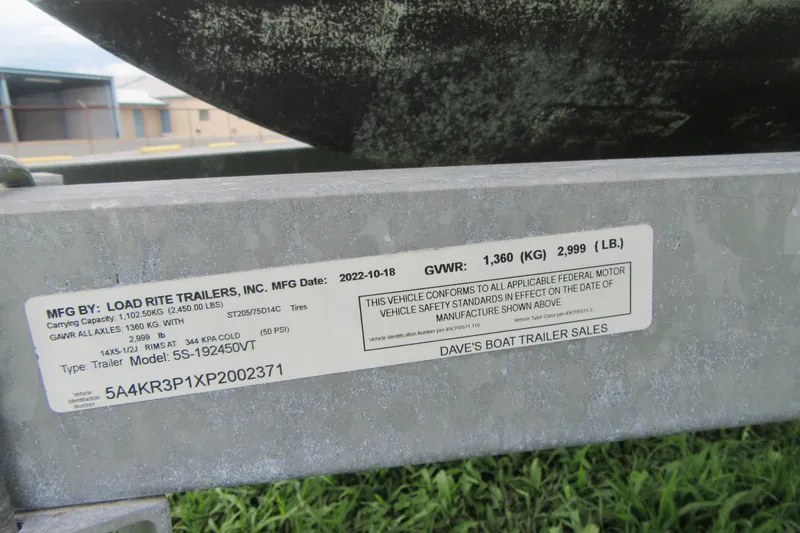 Slide: The Image of Label on Load Rite trailer showing specifications and compliance details. - 27