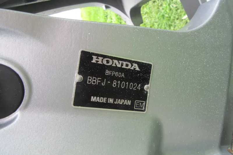 Slide: The Image of Label on Honda engine, model BFP60A, serial BBFJ-8101024, made in Japan. - 26