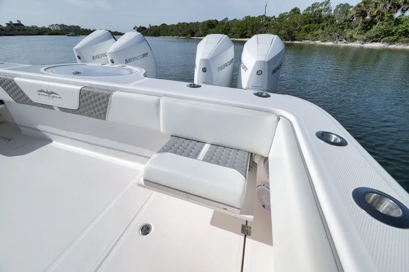 Slide: The Image of 2025 Invincible 35 Catamaran with Mercury engines, featuring sleek seating and modern design. - 43