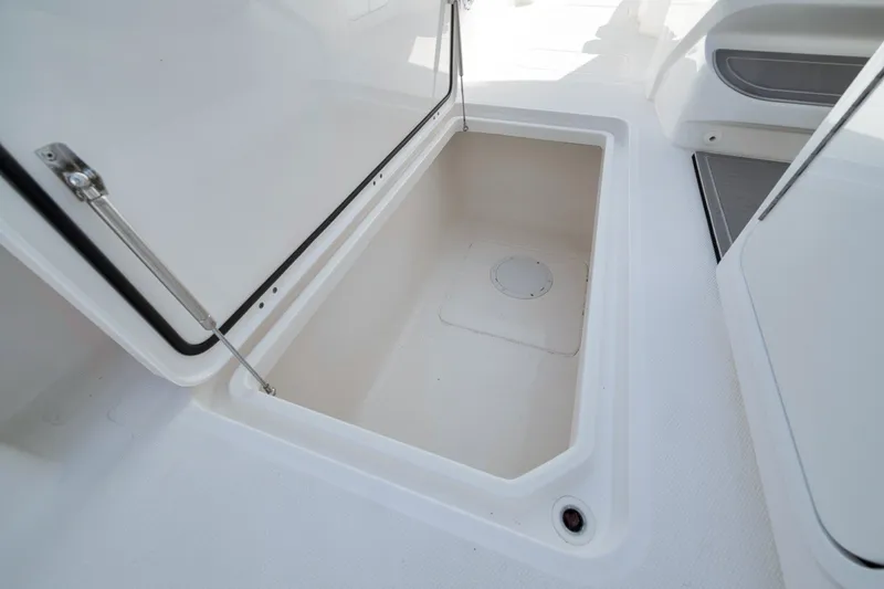 Slide: The Image of Storage compartment on 2025 Invincible 35 Catamaran, showcasing spacious interior design. - 31