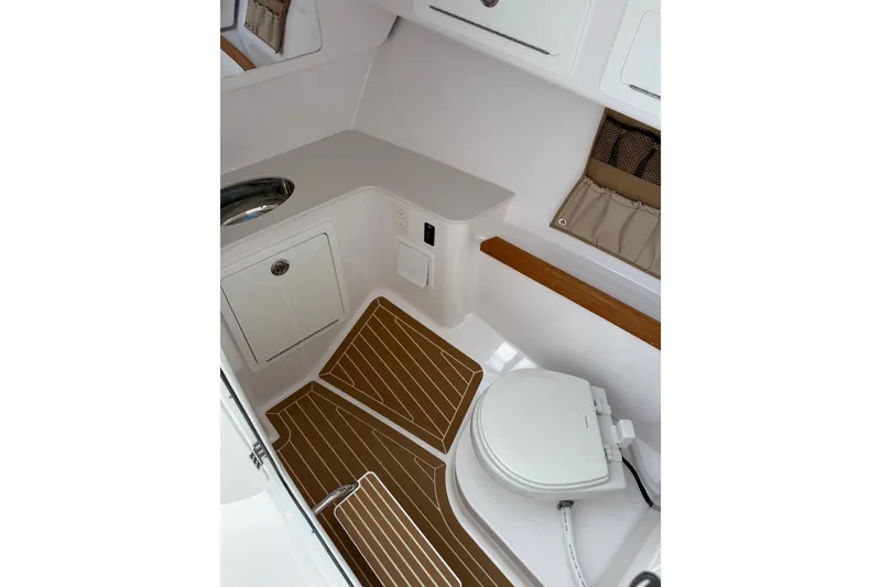 Slide: The Image of 2024 Southport 33 DC boat interior with modern bathroom amenities. - 39