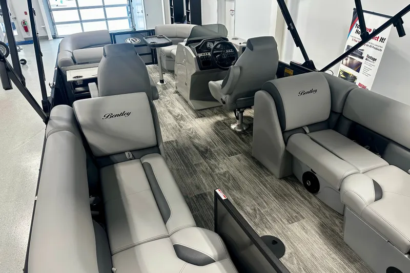 Slide: The Image of 2027 Bentley Pontoons Legacy 223 Navigator interior with luxurious gray seating and modern design. - 13