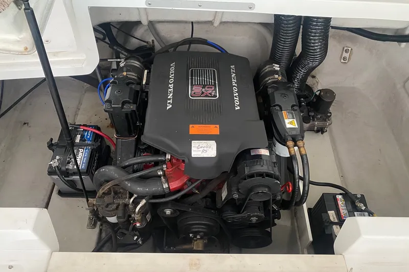 Slide: The Image of Engine compartment of a 2002 Cobalt 206 boat with Volvo Penta motor. - 10