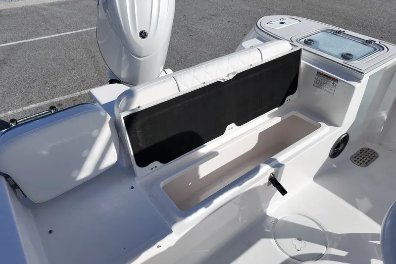 Slide: The Image of 2027 Sea Fox 228 Commander boat interior with open storage compartment. - 5