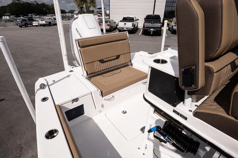 Slide: The Image of 2026 Blackfin 262 HB boat interior with tan seating and modern amenities. - 17