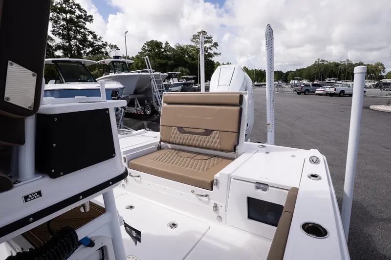 Slide: The Image of 2026 Blackfin 262 HB boat interior with tan seating and modern features. - 16