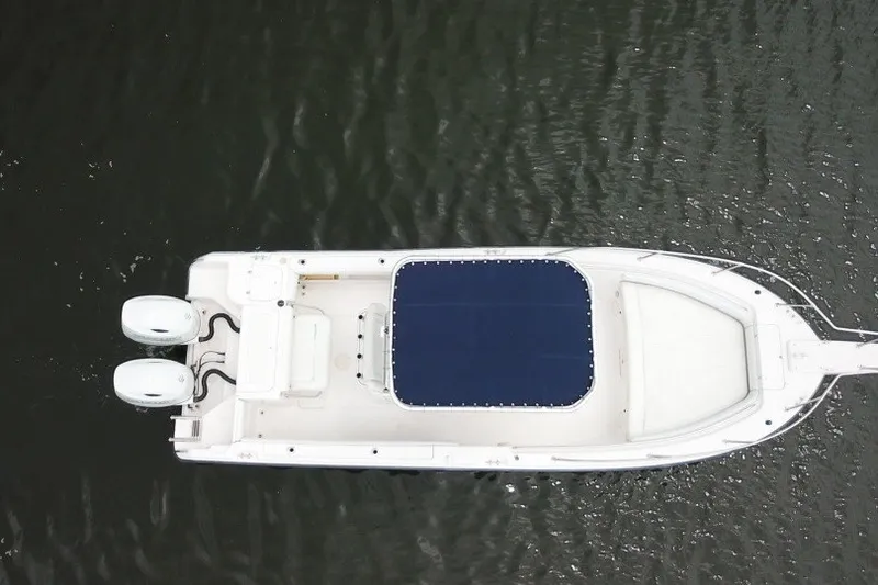 Slide: The Image of Aerial view of 2003 Grady-White Advance 257 boat with twin engines on water. - 5