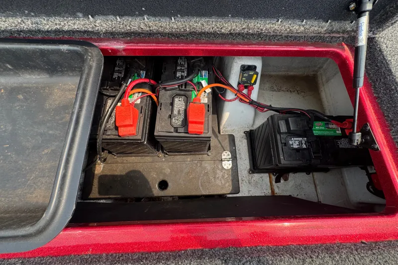 Slide: The Image of Battery compartment of a 2020 Nitro Z20 boat with multiple batteries and wiring. - 14