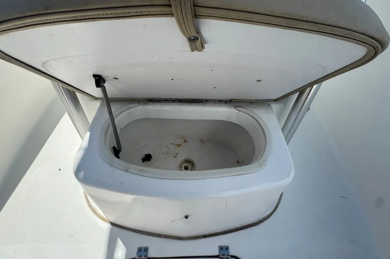 Slide: The Image of Open storage compartment on a 2016 Sea Fox 206 Commander boat. - 32