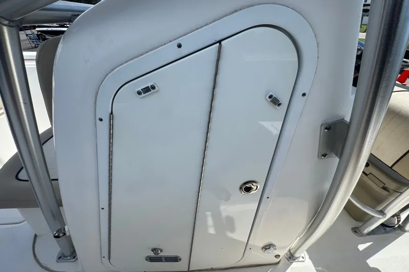 Slide: The Image of 2016 Sea Fox 206 Commander boat storage compartment with stainless steel railing. - 40