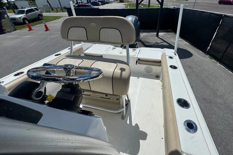 Slide: The Image of 2016 Sea Fox 206 Commander boat interior with steering wheel and seating. - 36