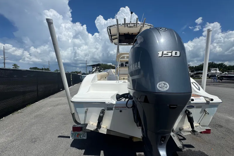 Slide: The Image of Rear view of a 2016 Sea Fox 206 Commander with a Yamaha 150 outboard motor. - 9