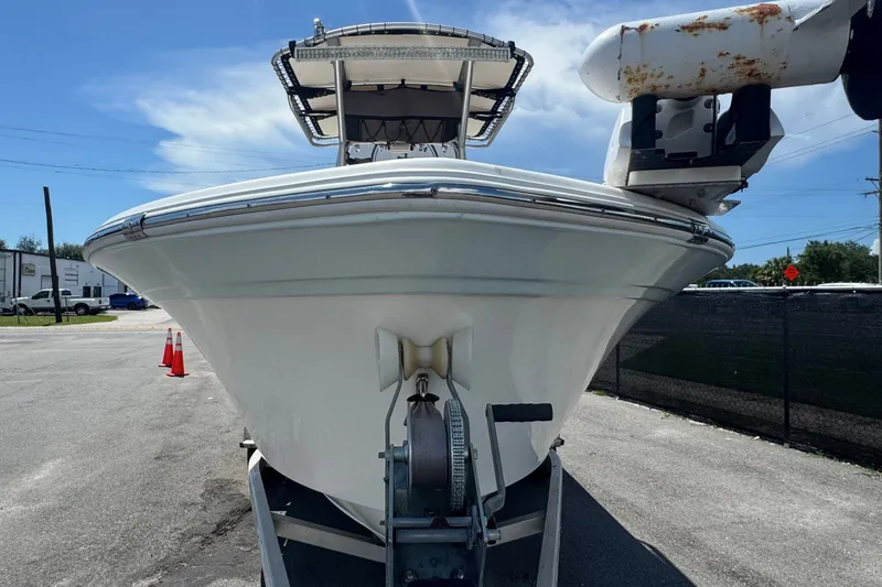 Slide: The Image of A 2016 Sea Fox 206 Commander on a trailer, parked under a blue sky. - 15