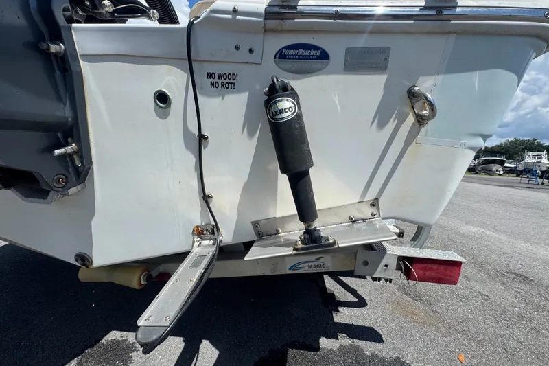 Slide: The Image of 2016 Sea Fox 206 Commander boat transom with trim tabs and "No Wood! No Rot!" label. - 4