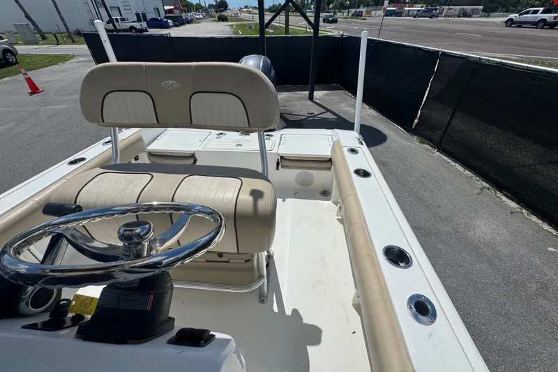 Slide: The Image of 2016 Sea Fox 206 Commander boat interior with steering wheel and seating. - 41