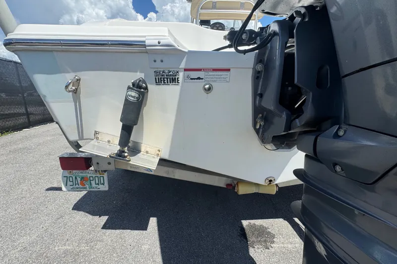 Slide: The Image of Rear view of a 2016 Sea Fox 206 Commander boat with Florida license plate. - 10