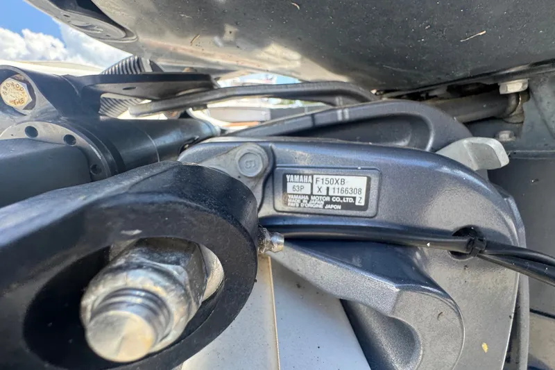 Slide: The Image of Close-up of Yamaha F150XB engine part on 2016 Sea Fox 206 Commander boat. - 49