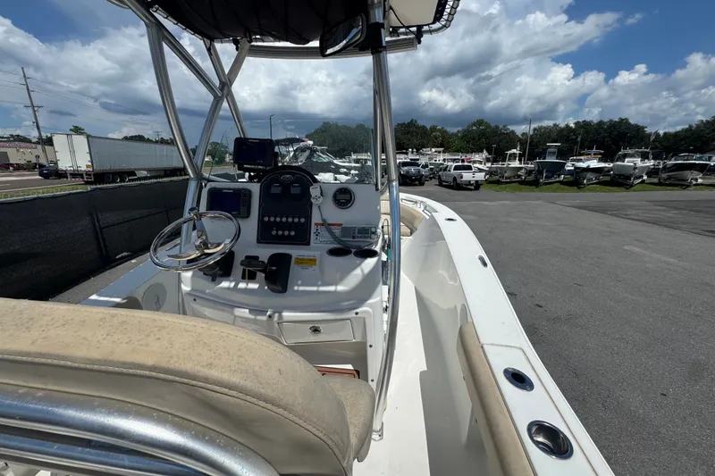 Slide: The Image of 2016 Sea Fox 206 Commander boat interior with steering console and seating. - 20