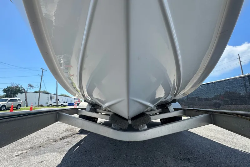 Slide: The Image of The underside of a 2016 Sea Fox 206 Commander on a trailer. - 17