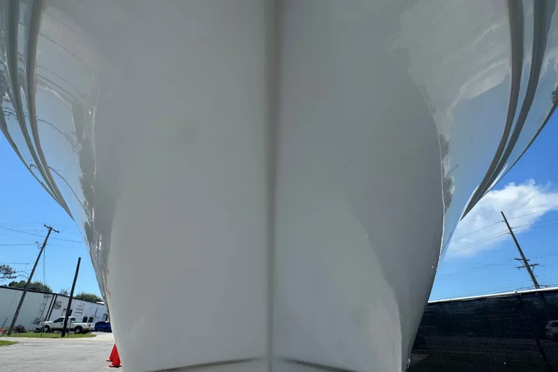 Slide: The Image of Close-up of the hull of a 2016 Sea Fox 206 Commander, parked in a lot. - 16