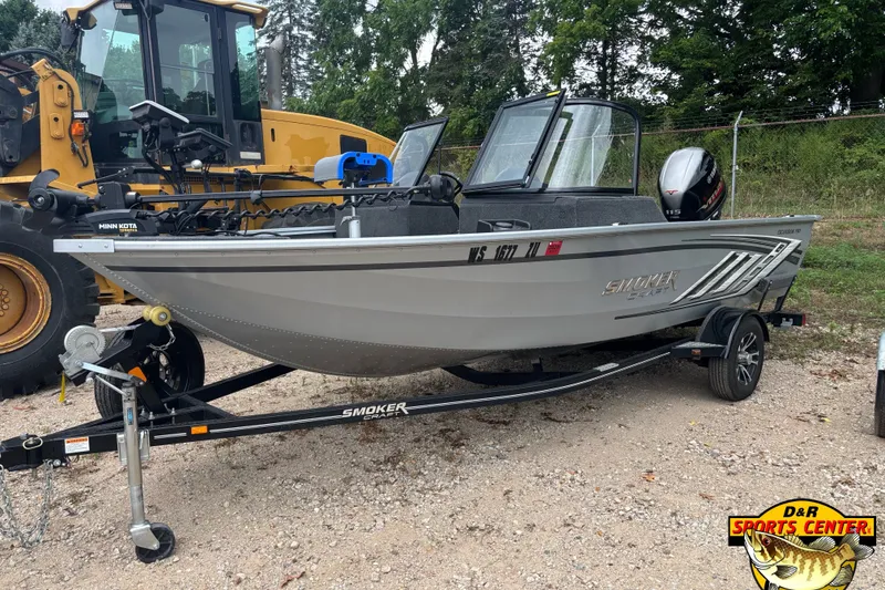 The Image of 2023 Smoker Craft Excursion 176 DC Pro boat on trailer, parked outdoors. - 0
