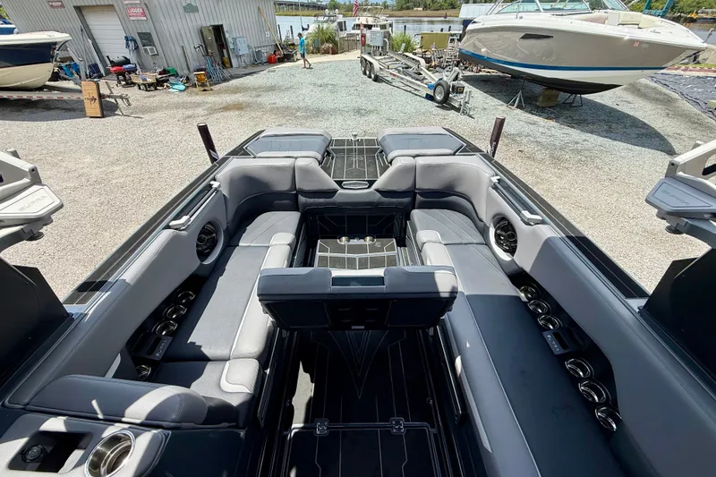Slide: The Image of 2022 Supra SE 450 boat interior with spacious seating and modern design. - 22