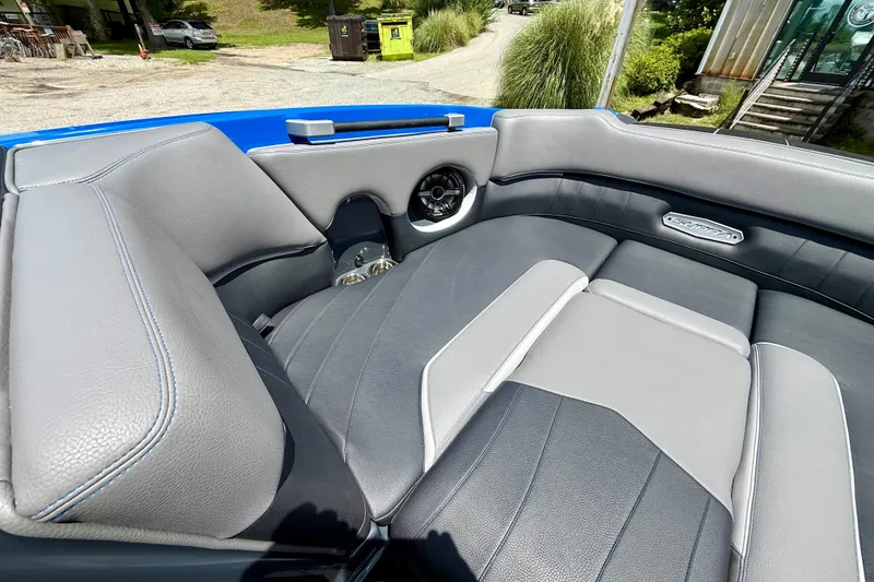 Slide: The Image of Luxurious interior of 2022 Supra SE 450 boat with gray leather seating. - 26