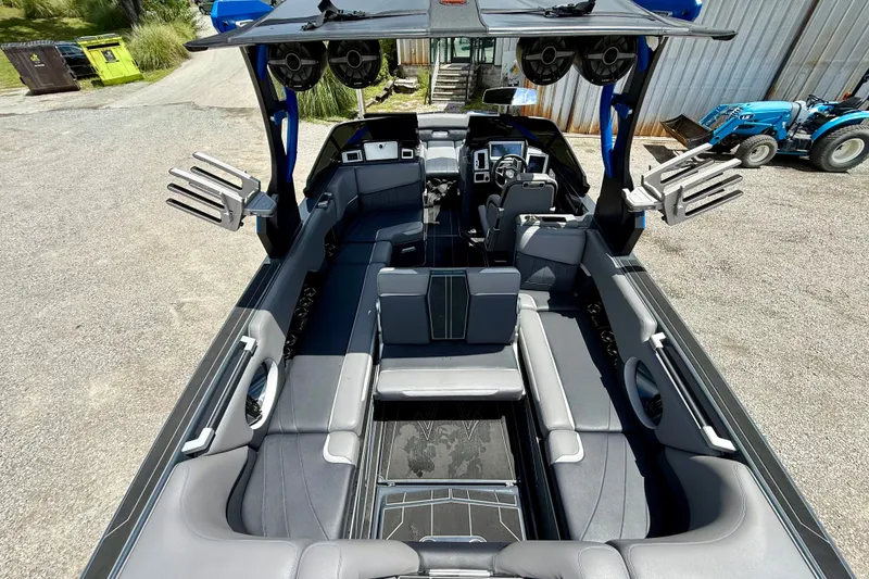 Slide: The Image of 2022 Supra SE 450 boat interior with sleek seating and advanced controls. - 11