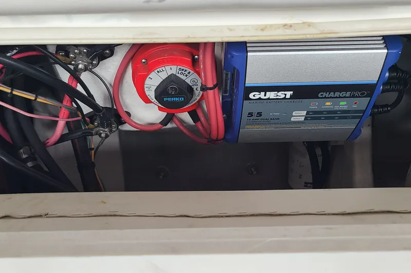 Slide: The Image of Marine battery charger setup in a 1994 Checkmate Pulsare 2100 boat. - 16