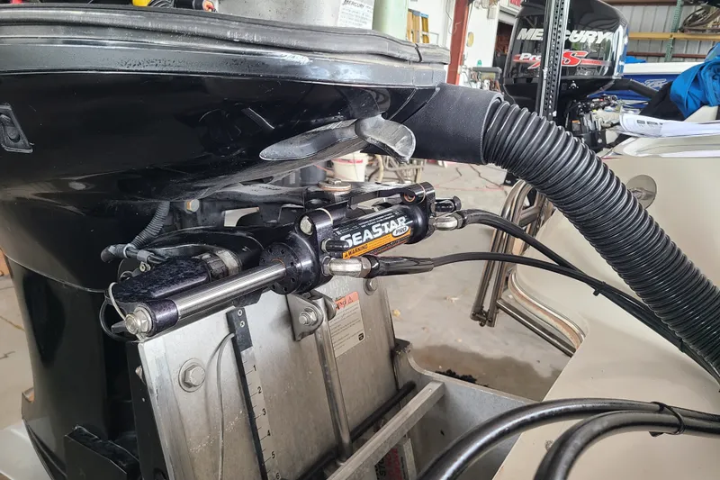 Slide: The Image of Close-up of a 1994 Checkmate Pulsare 2100 boat's hydraulic steering system. - 26