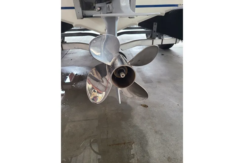 Slide: The Image of Propeller of a 1994 Checkmate Pulsare 2100 boat on a trailer. - 27