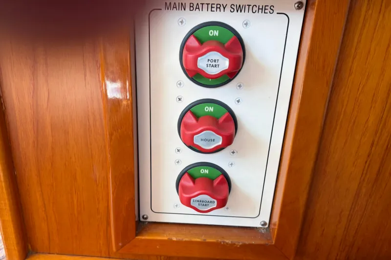 Slide: The Image of Main battery switches on a 2006 Bruckmann Bluestar 37 boat, featuring three labeled controls. - 29