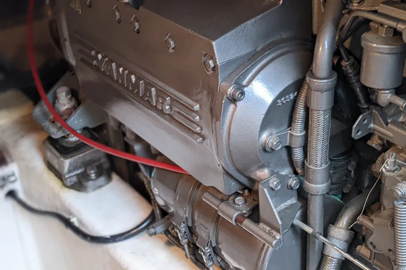 Slide: The Image of Close-up of a Yanmar engine in a 2006 Bruckmann Bluestar 37 boat. - 34