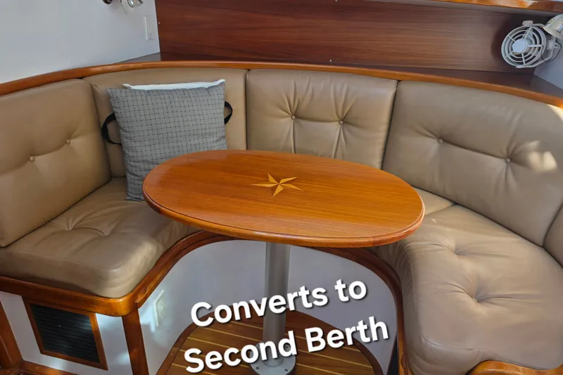 Slide: The Image of Cozy seating area in 2006 Bruckmann Bluestar 37, convertible to second berth. - 39