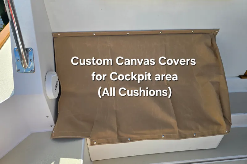Slide: The Image of Custom canvas covers for cockpit cushions on 2006 Bruckmann Bluestar 37 boat. - 19