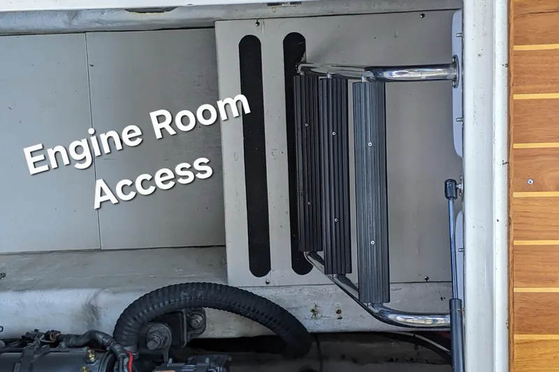 Slide: The Image of Engine room access of 2006 Bruckmann Bluestar 37 boat with ladder. - 33