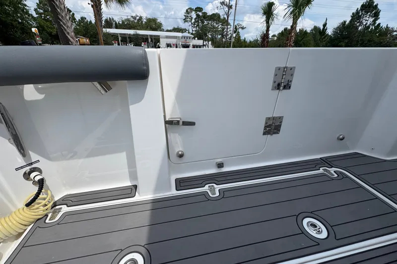 Slide: The Image of 2026 NauticStar 332 Offshore boat deck with sleek design and durable flooring. - 44